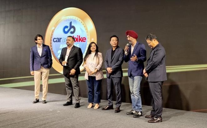 Team Kia India accepts the prestigious 2021 CNB Car of the Year award