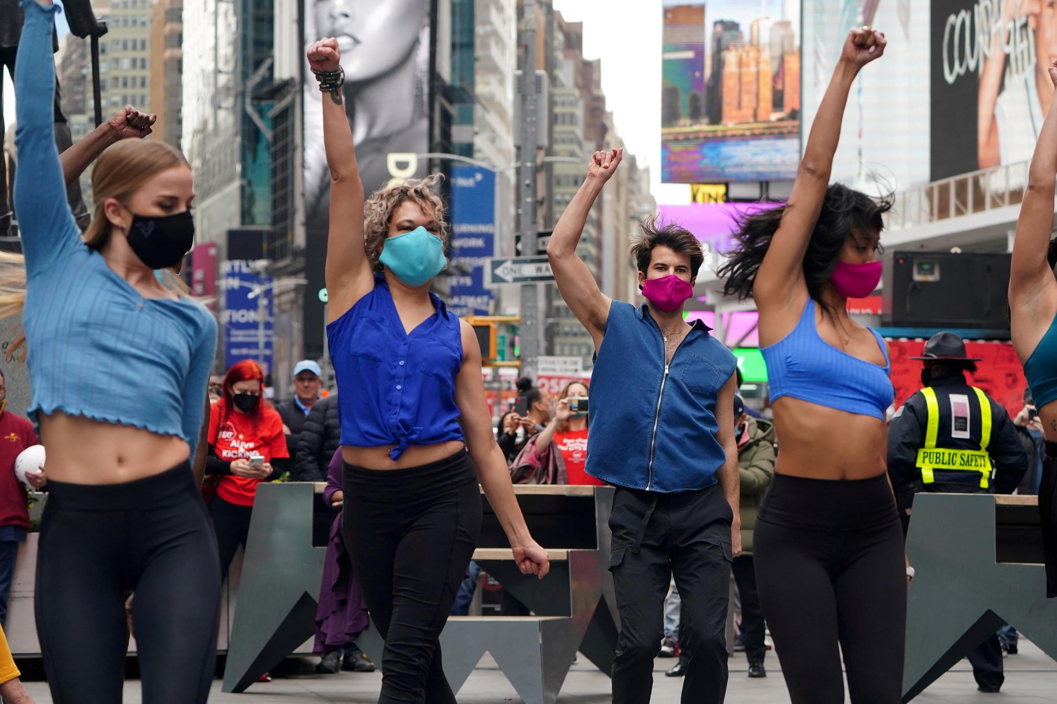 Performers take part in a pop up Broadway performance in anticipation of Broadway reopening in Times Square amid the coro<em></em>navirus disease (COVID-19) pandemic in the Manhattan borough of New York City, New York, U.S., March 12, 2021. REUTERS/Carlo Allegri