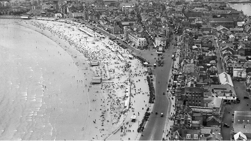 An aerial view of the Esplanade, the beach and the town in Weymouth, Dorset, taken in August 1932