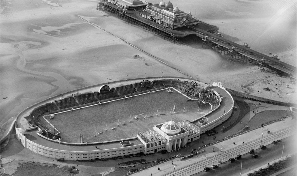 An aerial view of The Open Air Swimming Baths and Victoria Pier in Blackpool, Lancashire, taken in September 1929