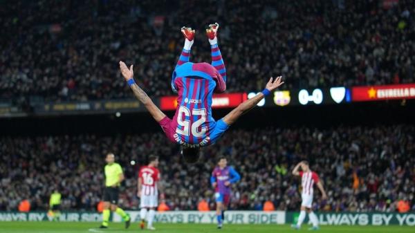 Pierre-Emerick Aubameyang celebrates his first goal with a somersault.